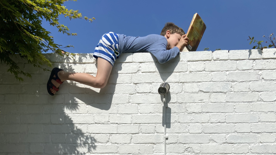 One memorable day in lockdown MAMA.codes CEO Liane let her son scale a garden wall and read up there for a change.